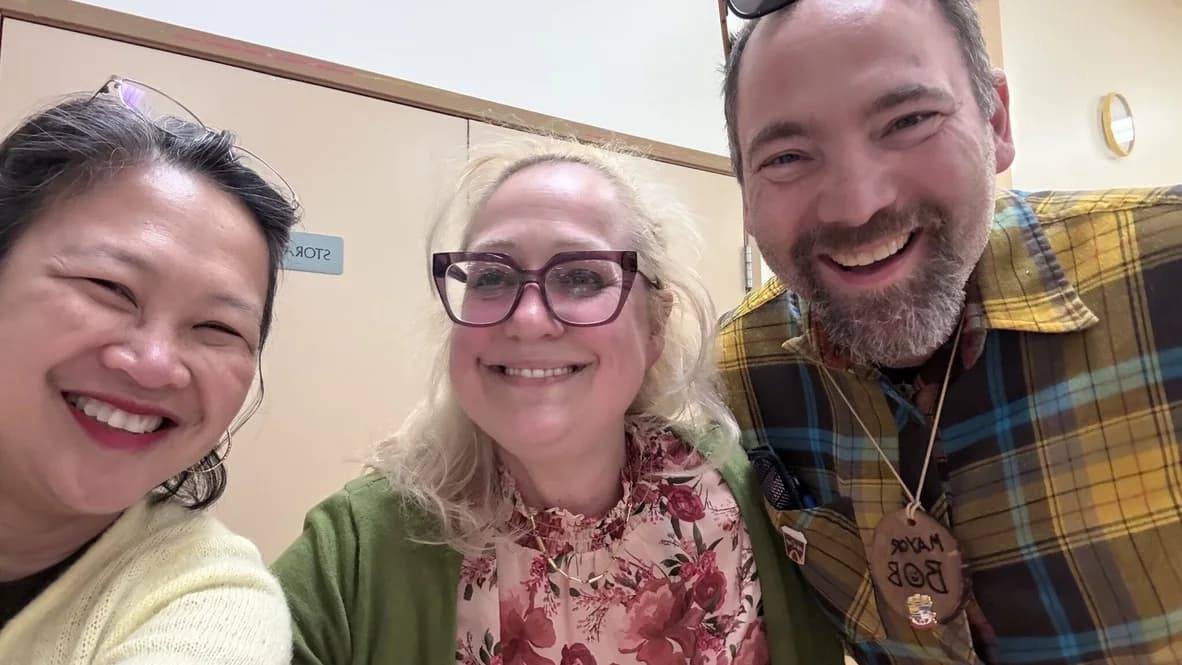 Three smiling members of the Comox Valley AI meetup crew.