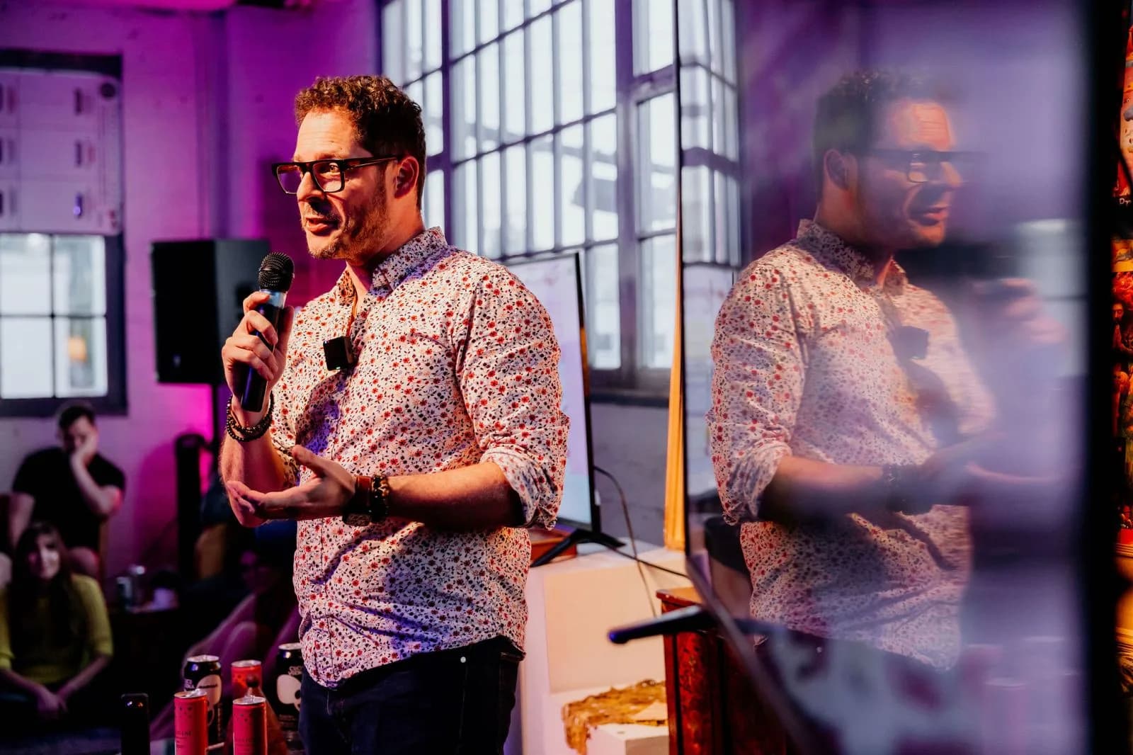 Kevin Friel speaks during a colourful live AI and lighting demonstration.