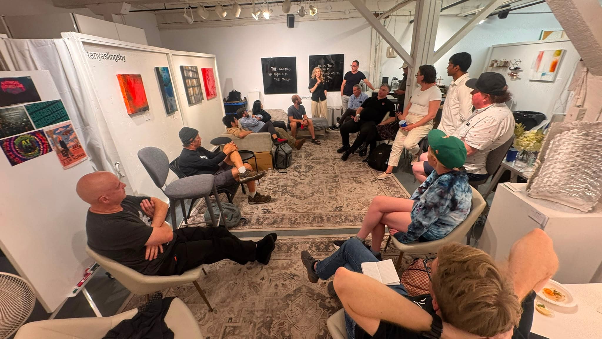 AI Ethical Futures Lab participants gathered in a discussion circle at Parker Street Studios.