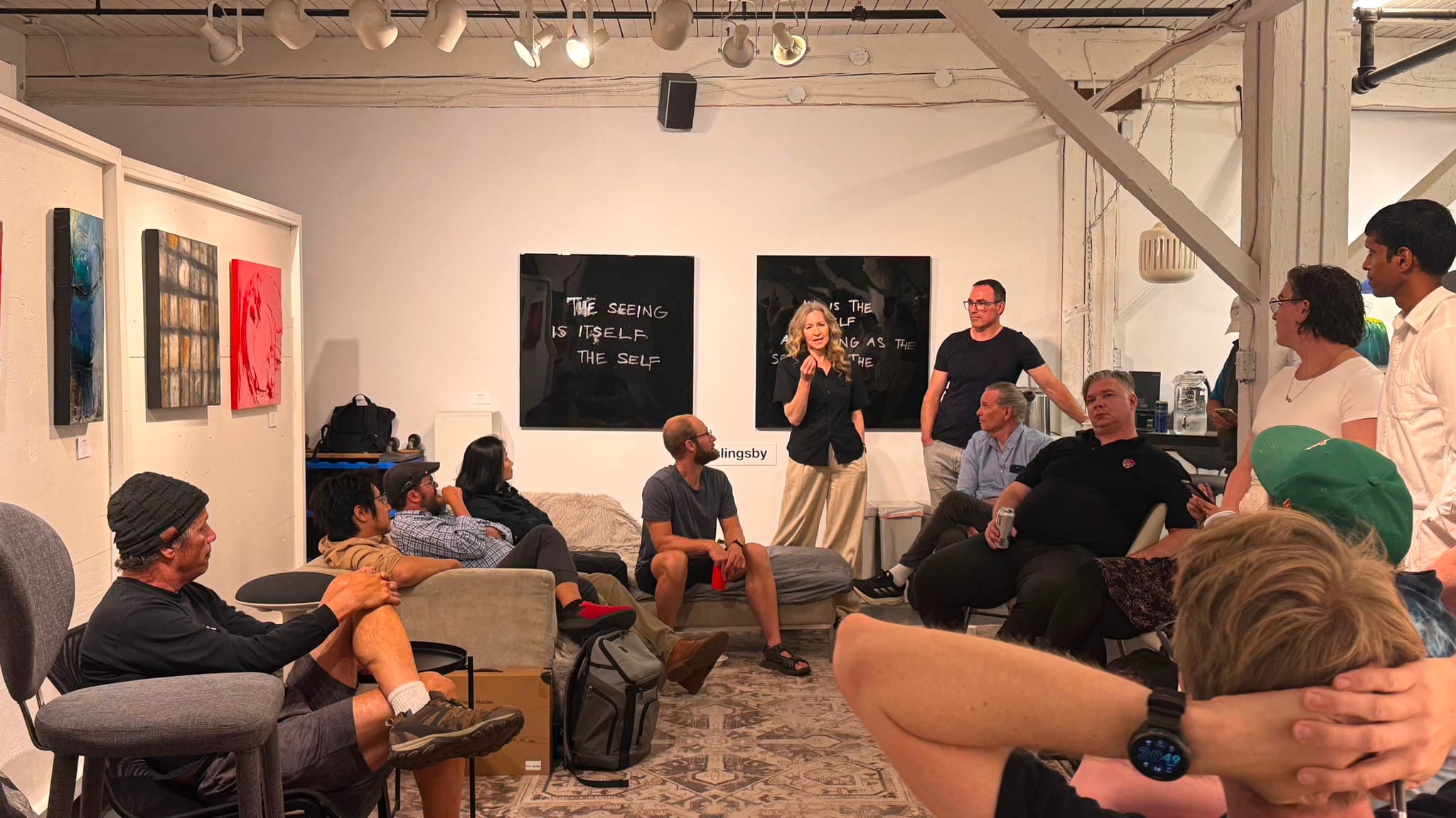 The AI Ethical Futures Lab seated in a discussion circle.