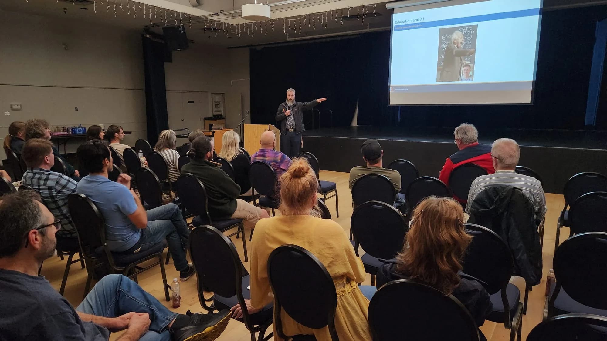 Craig Whitton presents to the Comox Valley AI room at the Florence Filberg Centre.