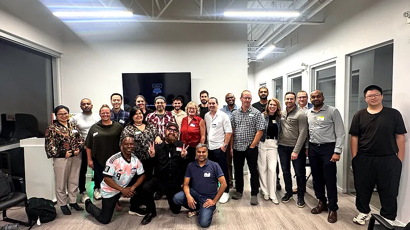 About twenty five attendees of the first FV+AI meetup stand together for a group photo in the Coleman Technologies office in Langley.