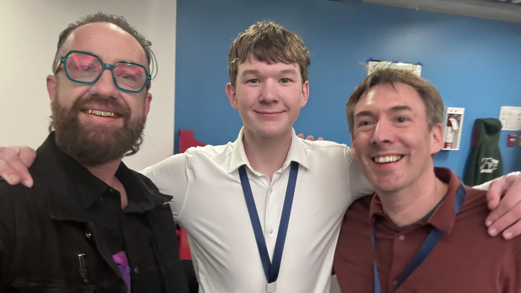 Kris Krug stands with youth robotics supporters at the FIRST Tech Challenge World Championship.